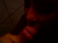 She is sucking Daddy in the WC
